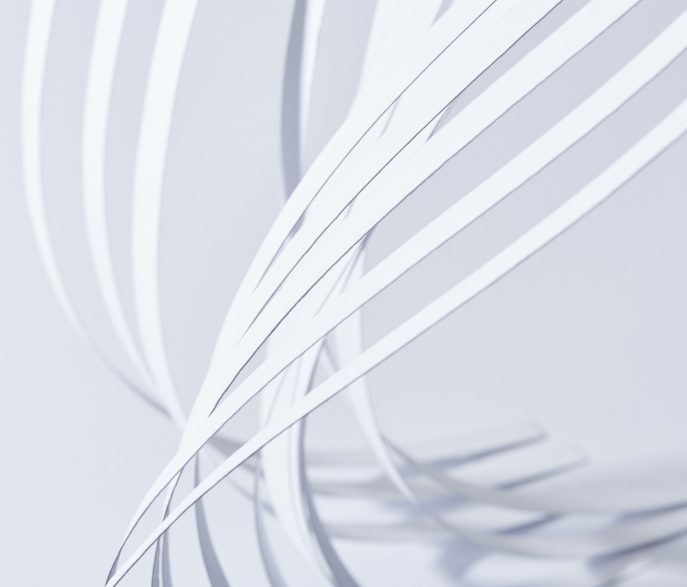 close-up-view-curved-paper-stripes-white-background close-up-view-curved-paper-stripes-white-background